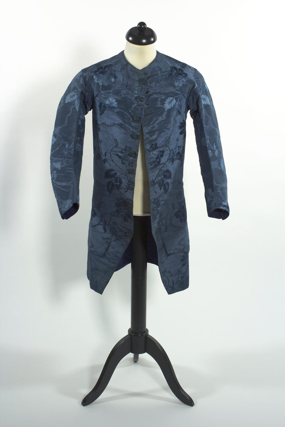 Blauw zijden herenvest of kamisool met lichtblauw bladmotief