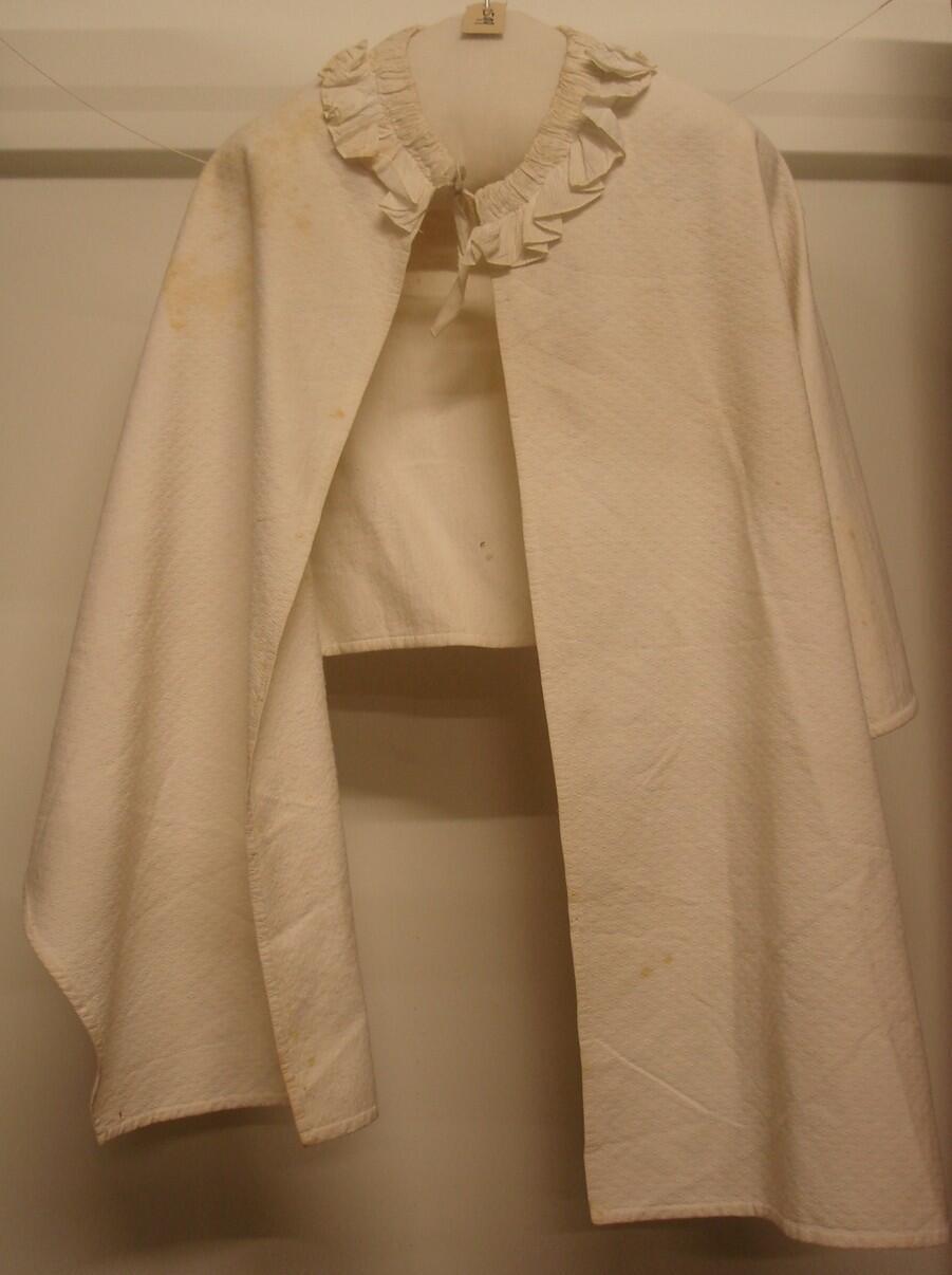 Witte kapmantel