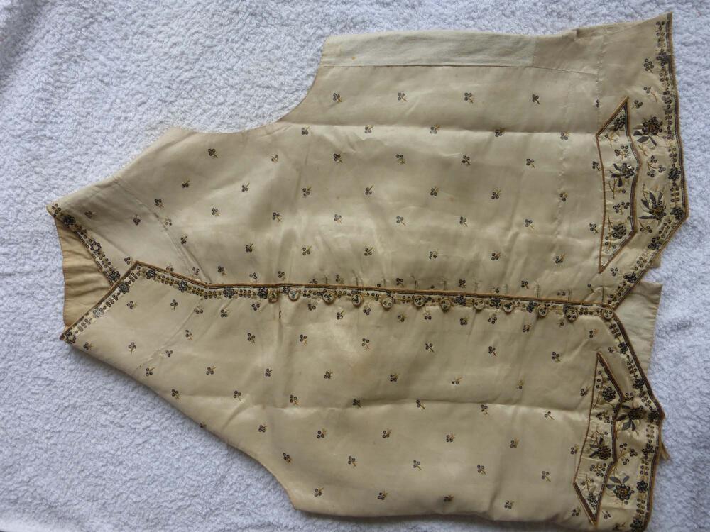 Mouwloos vest versierd met pailletten