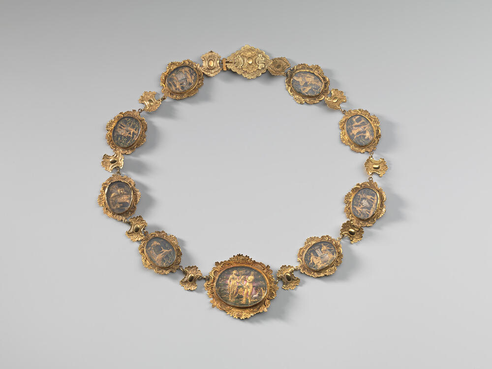Collier met bijbelse voorstellingen (bootjesketting)