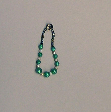 Kralenketting (van Barbiepop)
