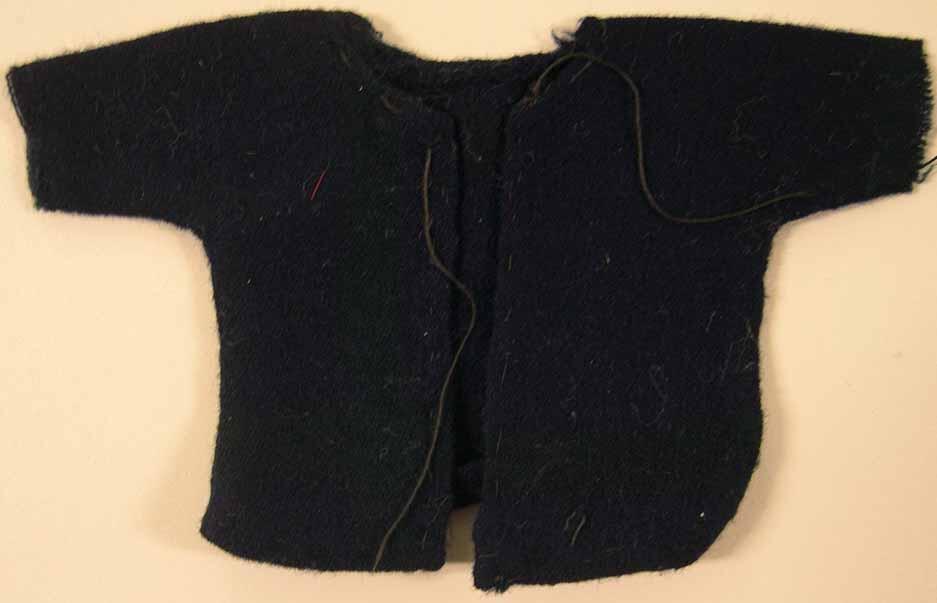 Kleding van popjes uit poppenhuis (jasje)