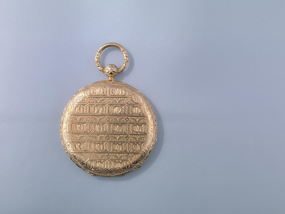 Zakhorloge met machinaal gegraveerde buitenkast
