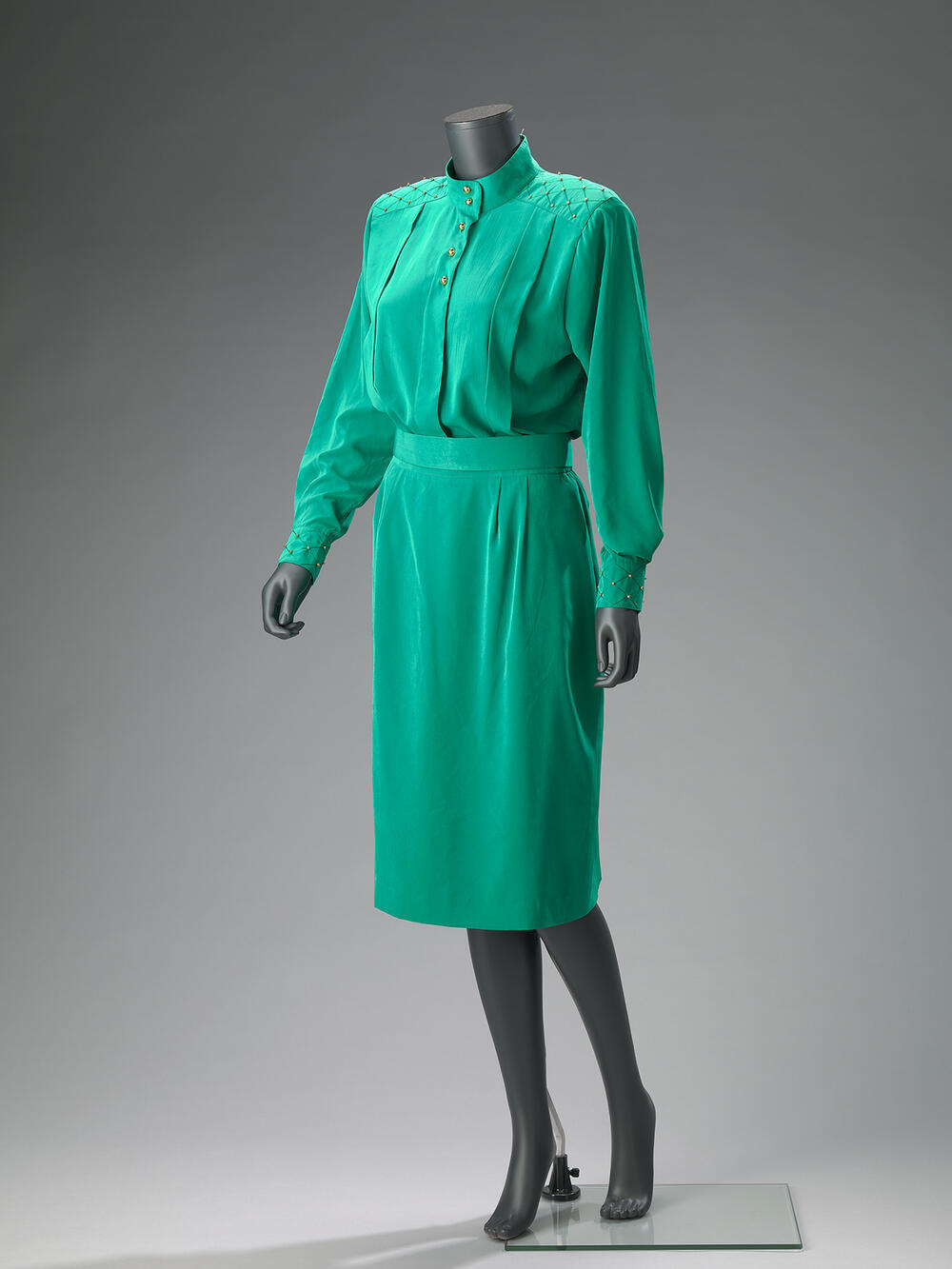 Groene blouse, rok en ceintuur