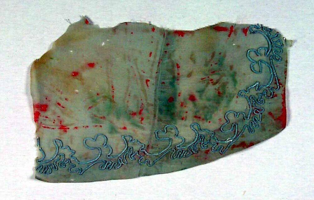 Kledingfragment van groene zijde