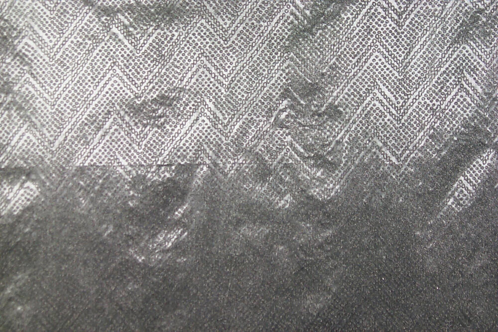 Zwarte glitterdruk op polyamide