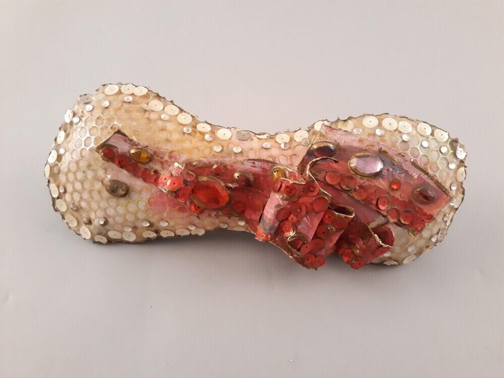 Maandverbandbroche