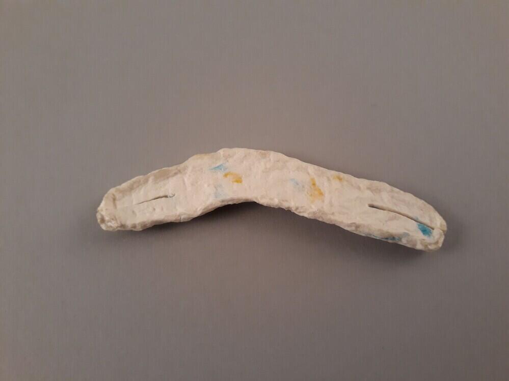 Broche van papier-maché