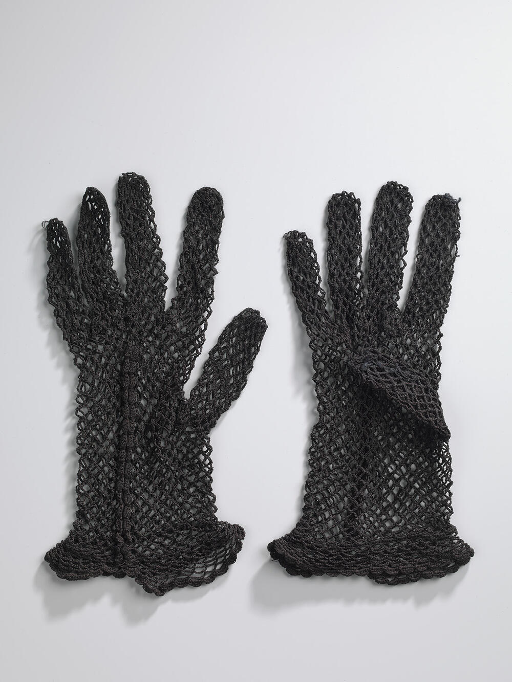 Paar zwarte handschoenen