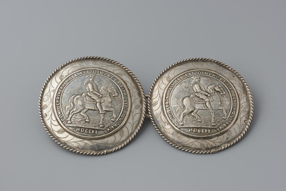 Paar zilveren broekstukken, Axel, 1912