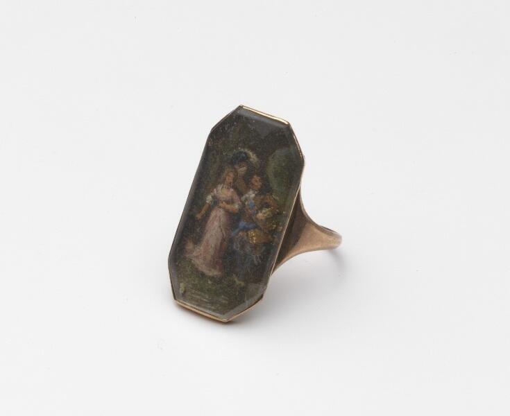 Gouden ring, zgn. marquisering, rechthoekig schild waarop geschilderd een ridder met zijn gemalin