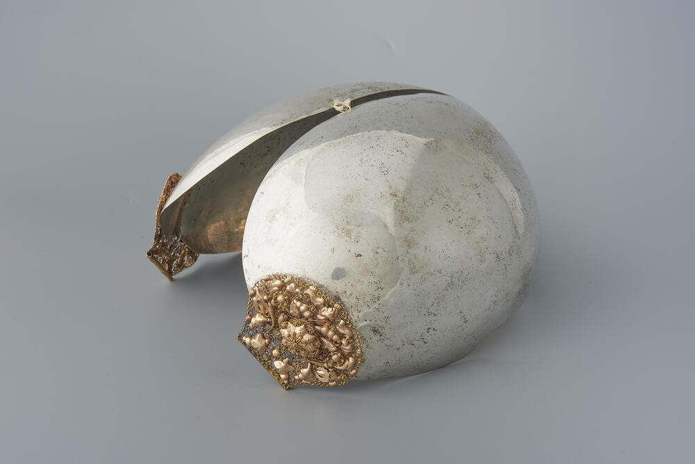 Zilveren oorijzer met gouden stiften, 1913