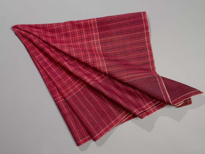 Hindelooper sondook met ingeweven ruit in rood, blauw en wit met 'lapkede mei greet krabbede'