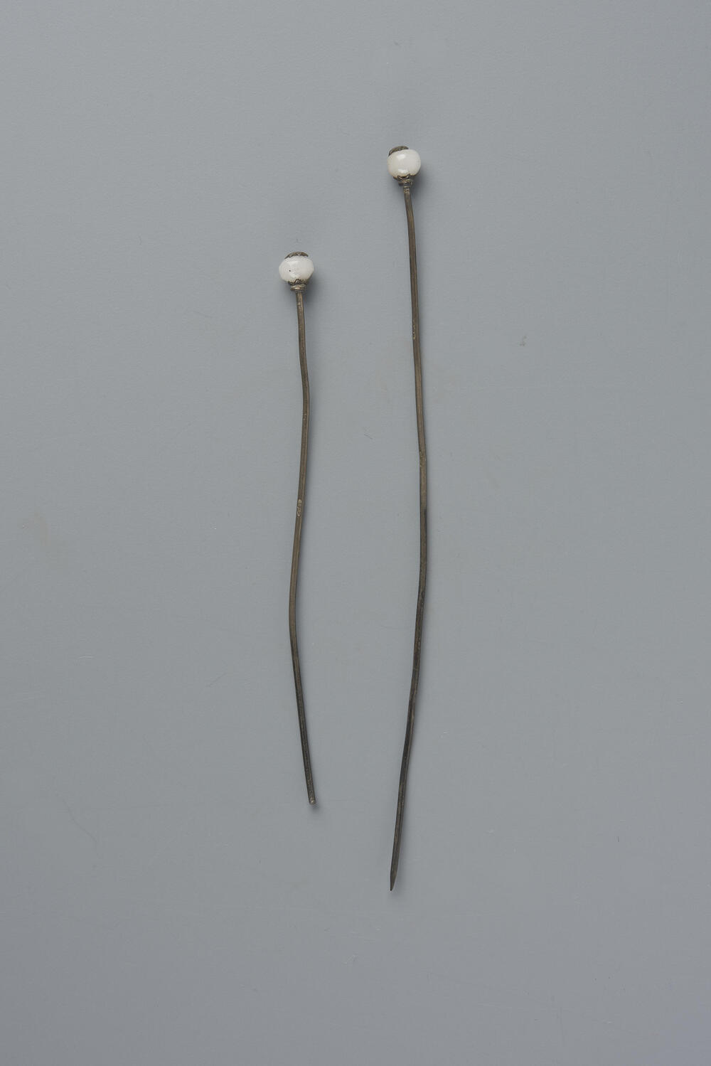 Paar mutsenspelden, Friesland, 1814–1906