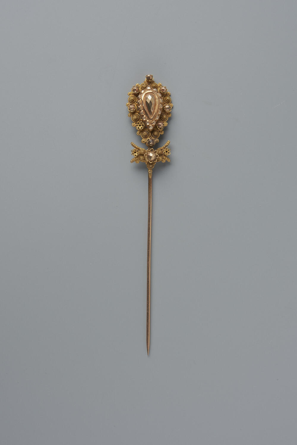 Gouden kapspeld, Laren (N.H.), 1875–1880