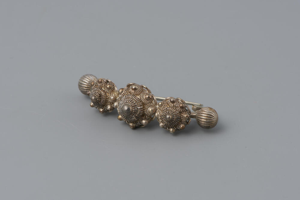 Zilveren doekbroche, Nieuw- en Sint Joosland, 1920–1930