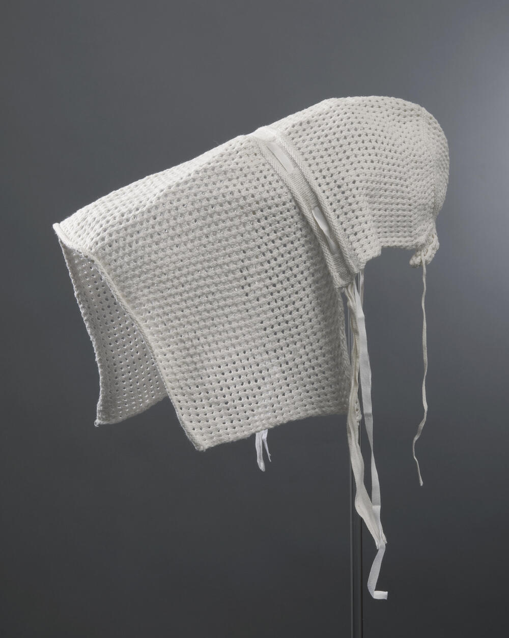 Gebreid kapertje voor baby, Noord-Brabant, voor 1950