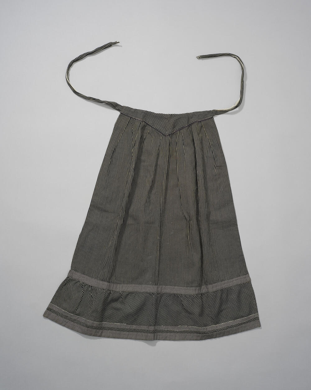 Gestreept visiteschortje, Schouwen, 1900–1948