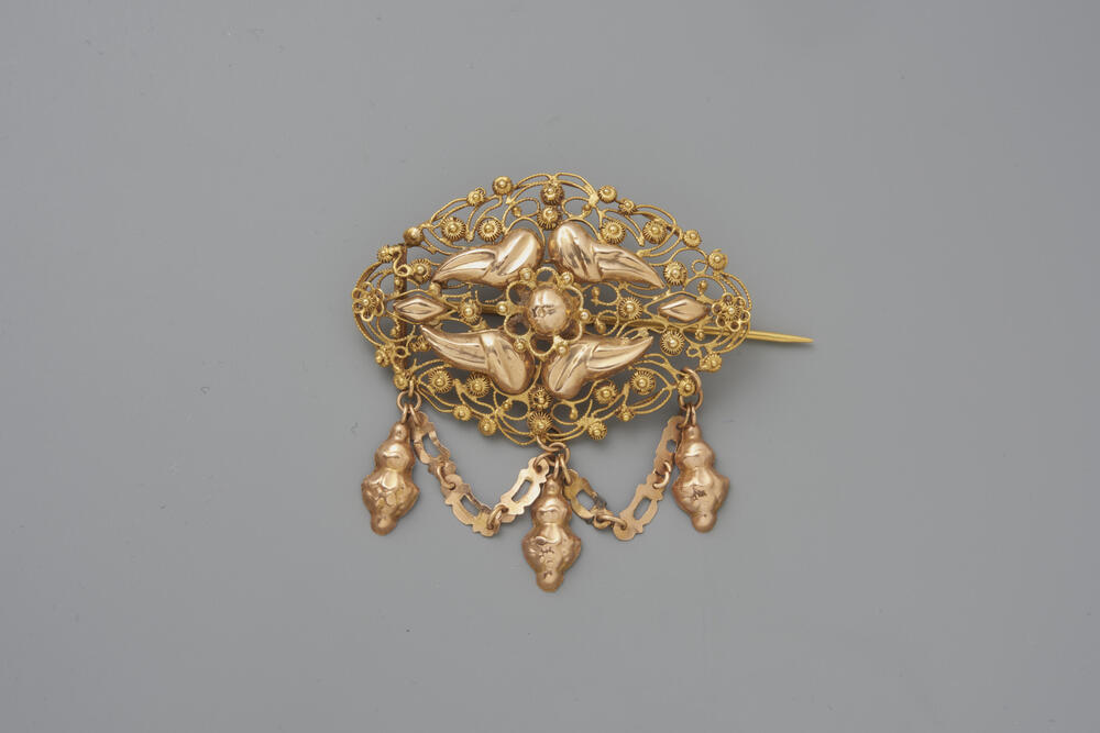 Gouden broche, Tholen, 1868–1888