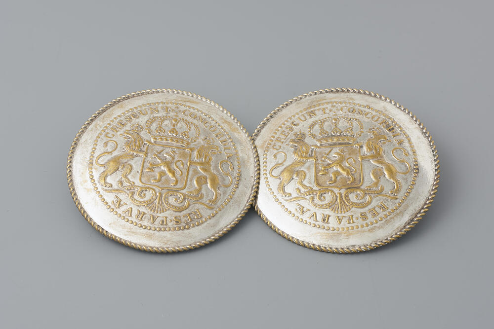 Verzilverde messing broekstukken, Walcheren, 1850–1875