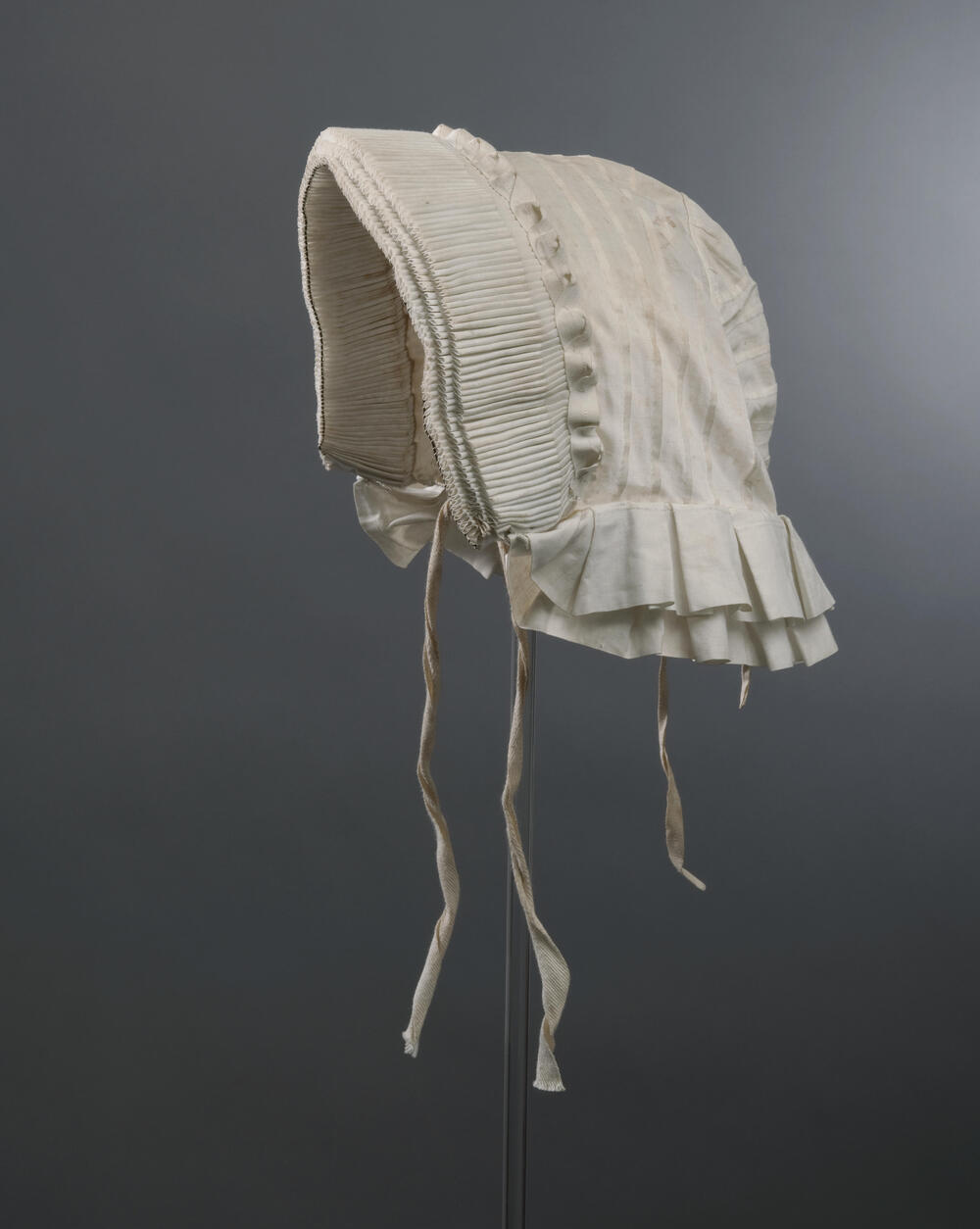 Katoenen muts voor de rouw, Andel, voor 1958