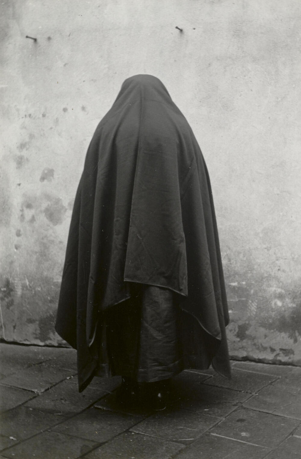 Vrouw in rouwdracht uit Stein, 1950