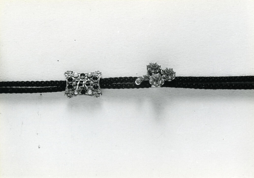 Schuivertjes van horlogekoord, Axel, 1950