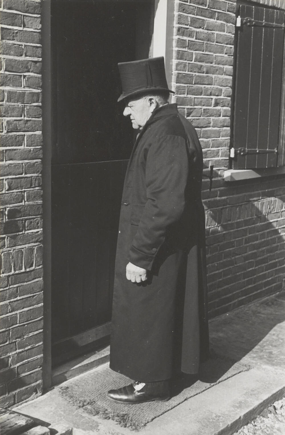 Man in streekdracht, Huizen, 1945