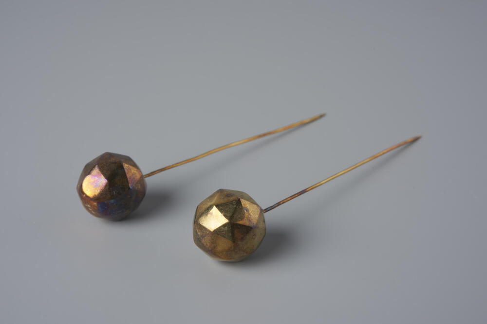 Paar gouden kapspelden, Walcheren, 1910–1915