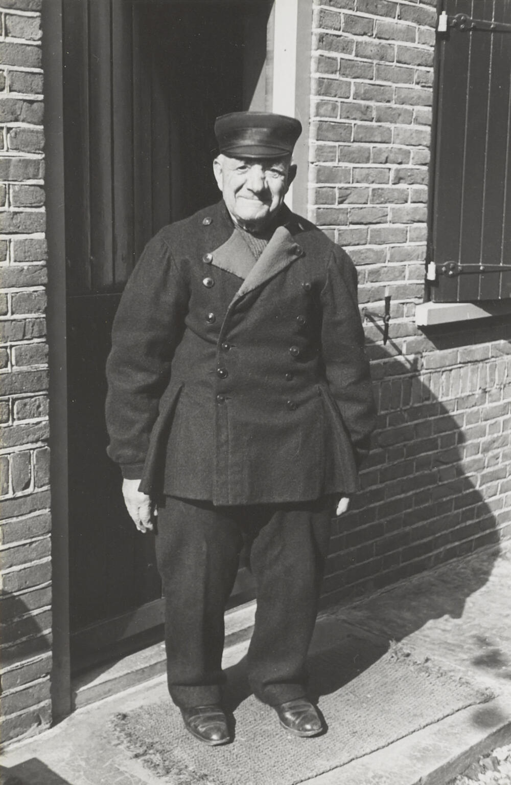 Man in streekdracht, Huizen, 1945