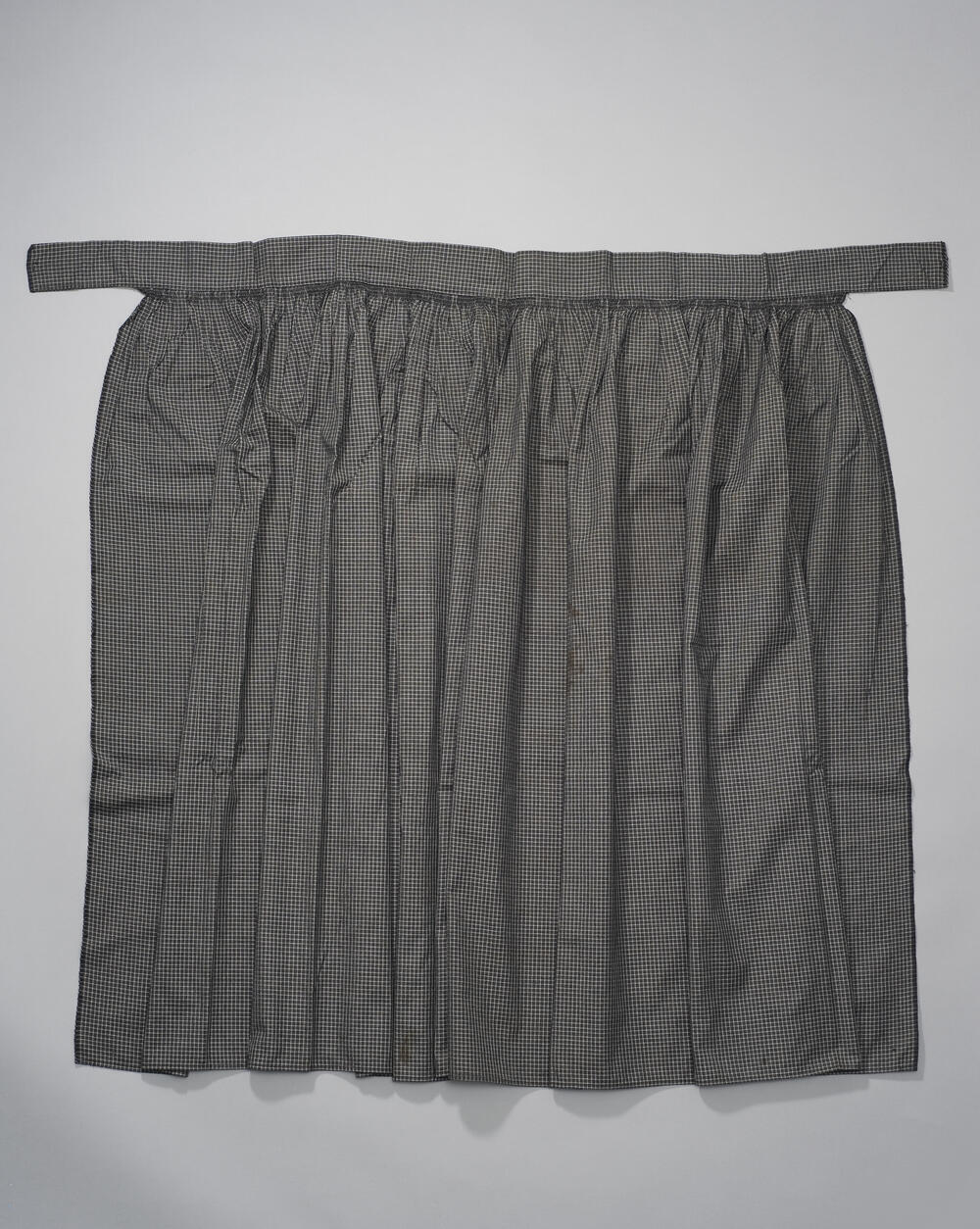 Schort, Ovezande, 1900–1985