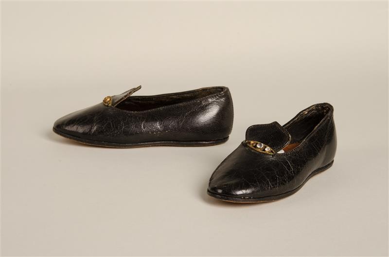 Paar poppenschoenen