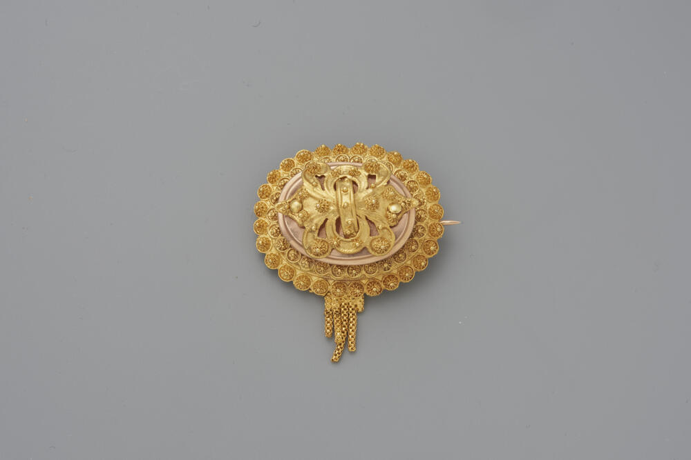 Gouden broche, Scheveningen, 1906–1954