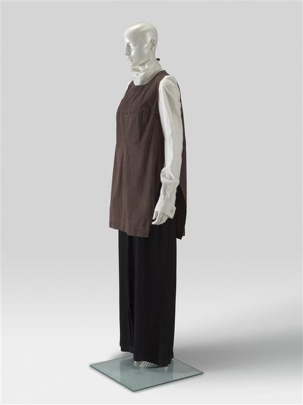 Set bestaande uit blouse, hes, overgooier en col