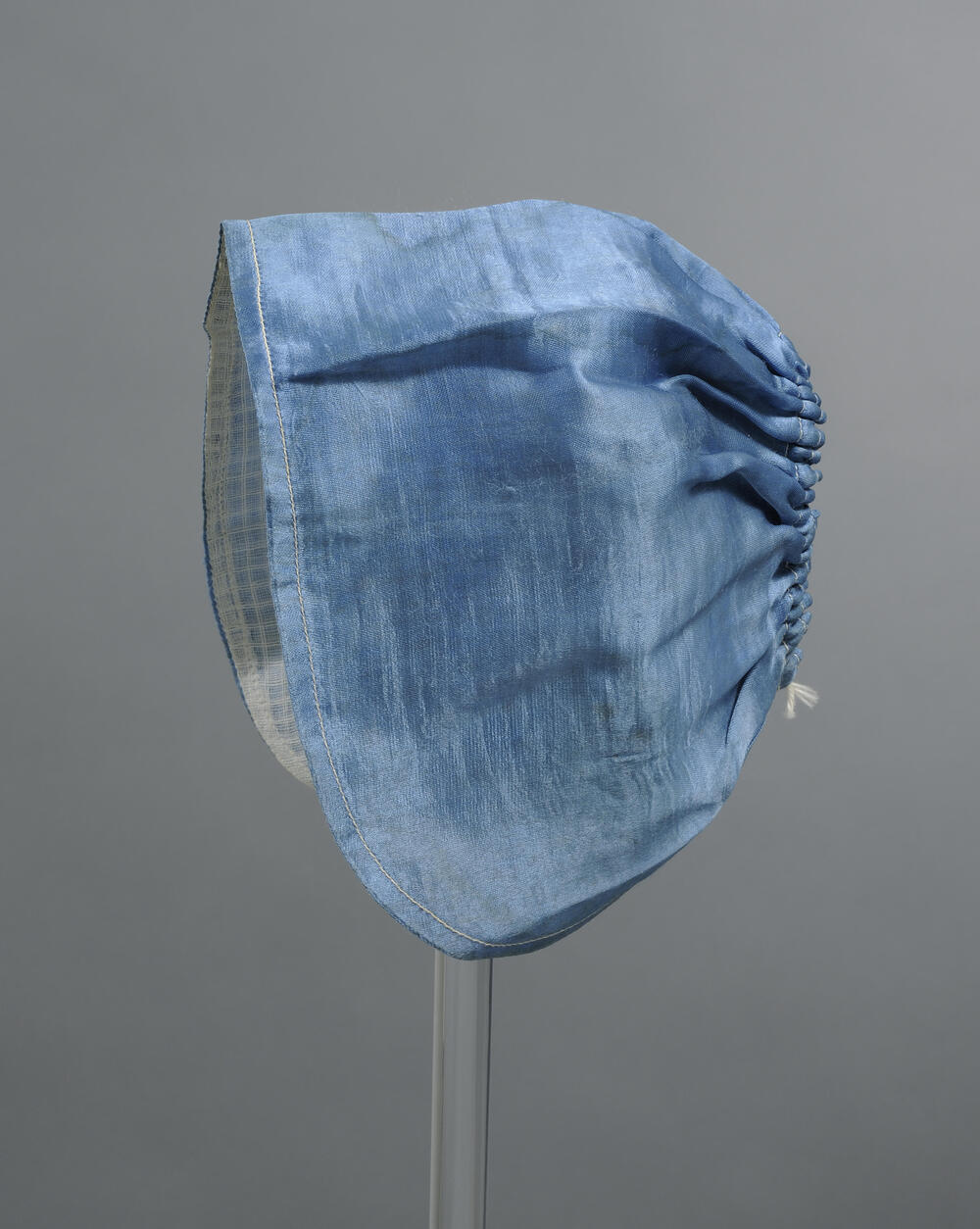 Blauw tussenmutsje, Ovezande, 1900–1985