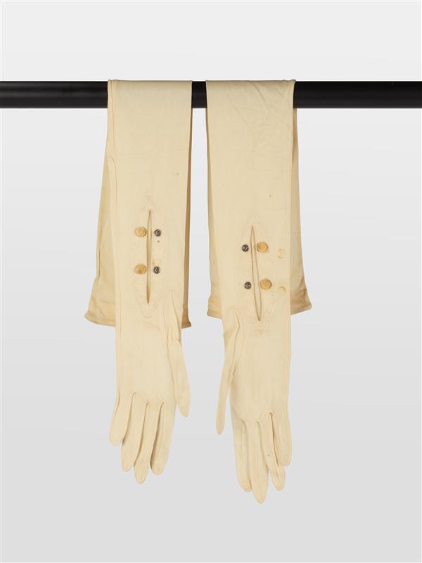 paar lange licht beige handschoenen
