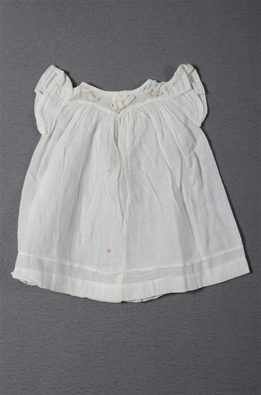 Poppenmouwschortje