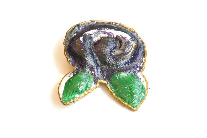 Broche paarse bloem