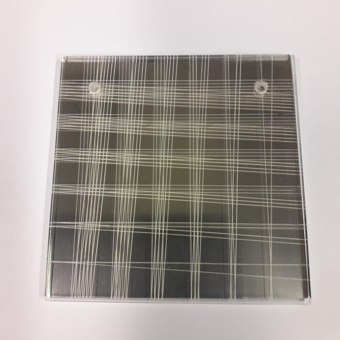 Broche van roestvrijstaal en acrylaat
