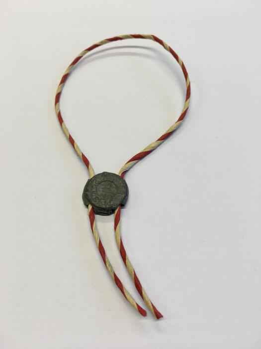 Armband van gedraaid papier en lood