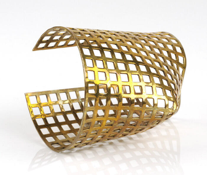 Armband van gedreven en verguld messing