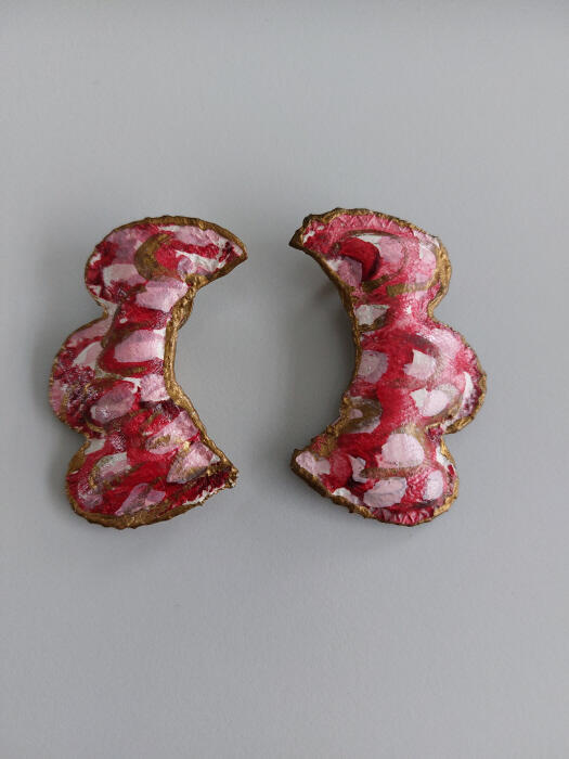 Oorsieraad in goud en roze