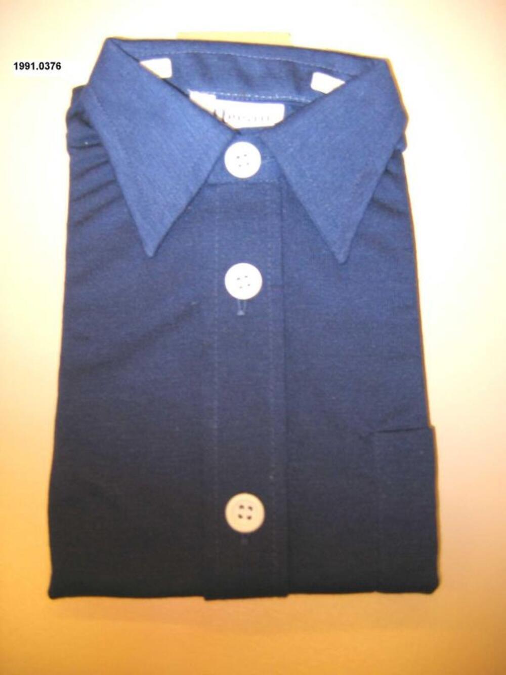 Overhemdblouse in donkerblauwe tricotstof