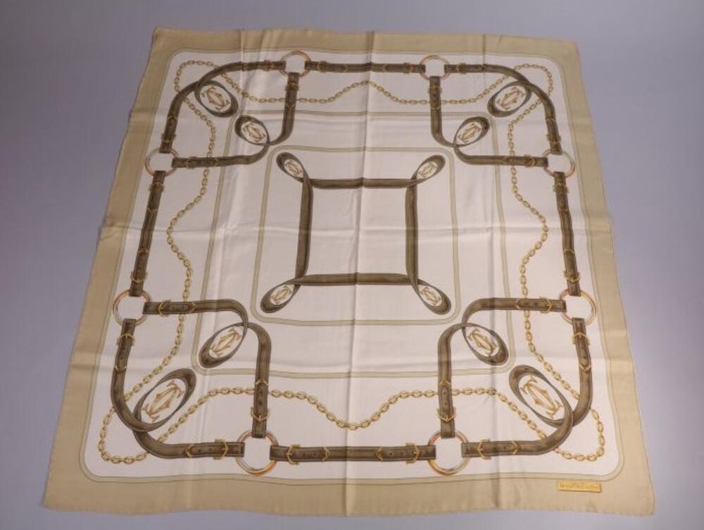 Foulard in lichtgroene en ecrukleurige zijde met print