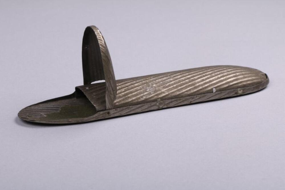 Brilkoker in metaal