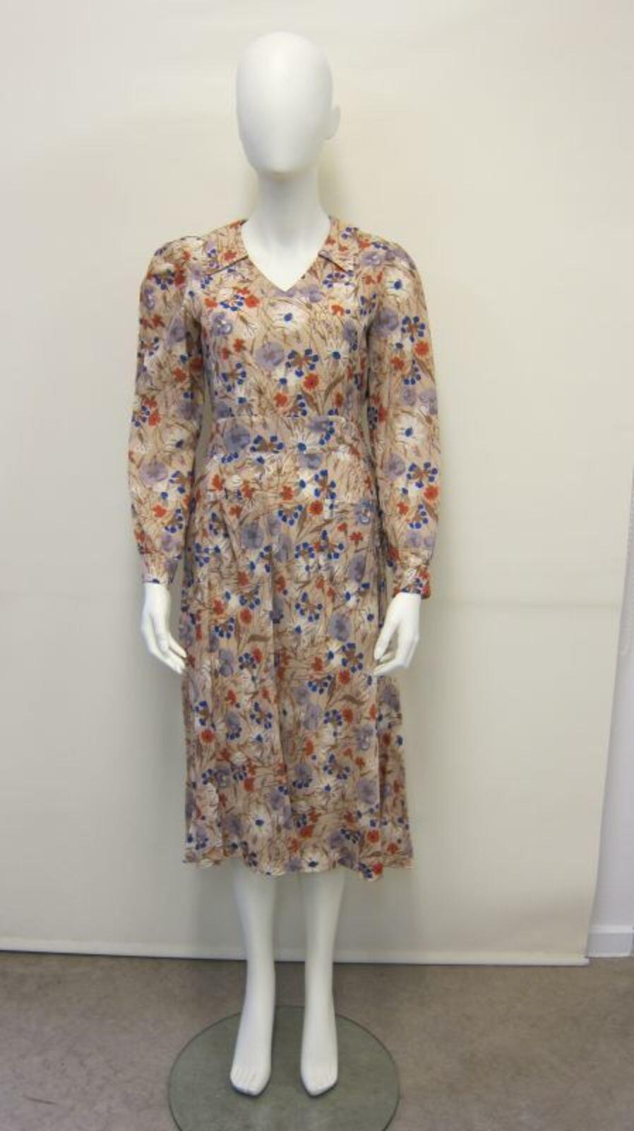 Jurk in beige kunstvezel met bloemenprint