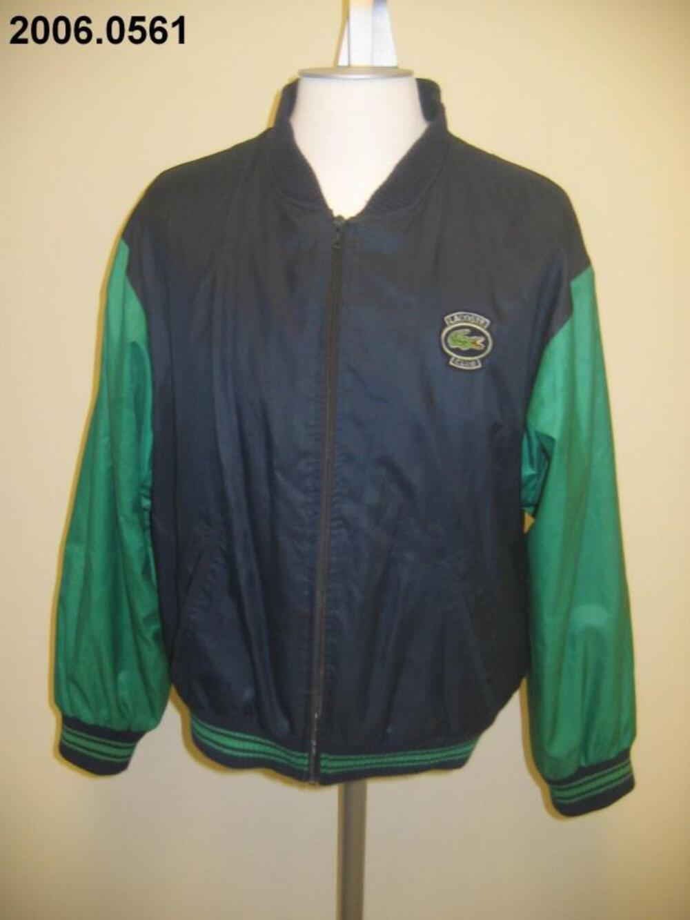 Bomberjack in blauwe polyester met groene mouwen