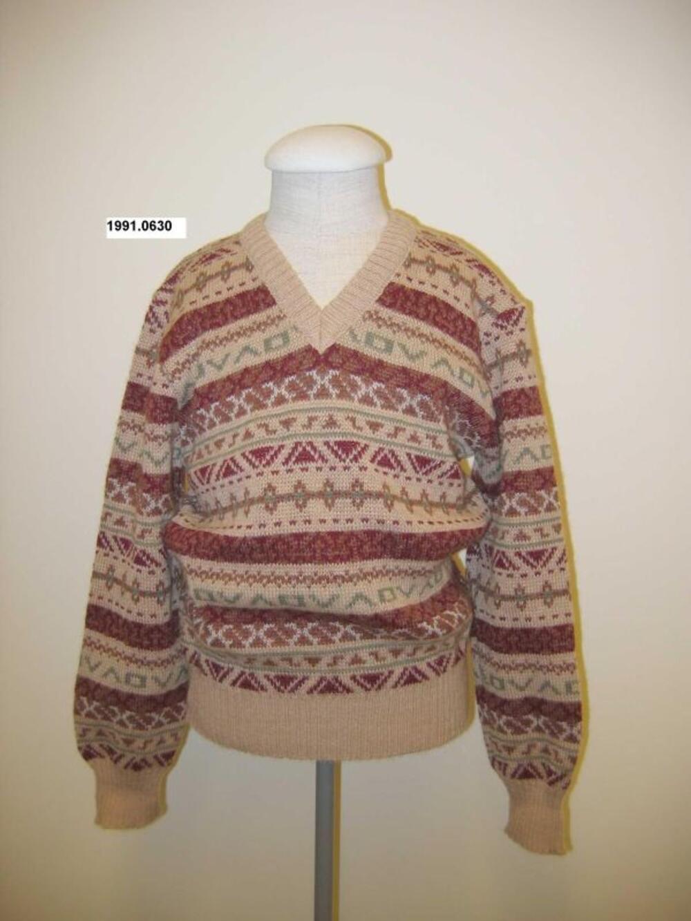 Trui in beige stof met jacquardtekening