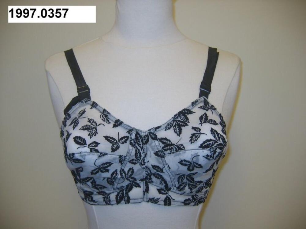 Bustehouder in witte nylon met zwart fluwelen blaadjes