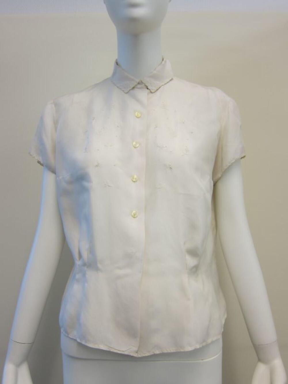 Blouse in ecru zijde